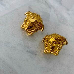 Brand new Versace gold stud earrings. Never worn.